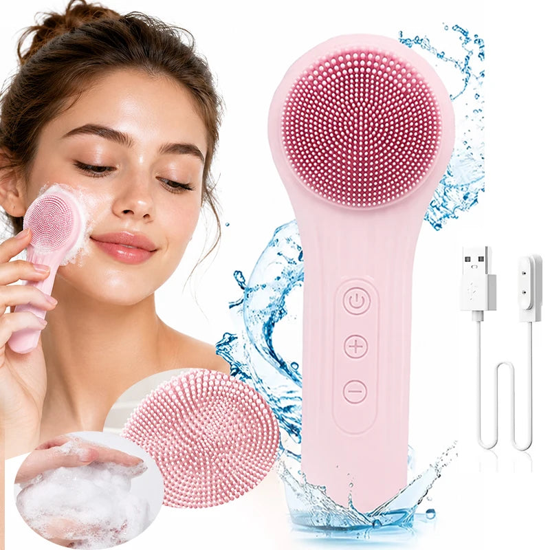 Pink facial cleansing brush with USB cable and water droplets on a white background