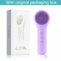 Purple silicone facial cleansing brush with original packaging box on a white background